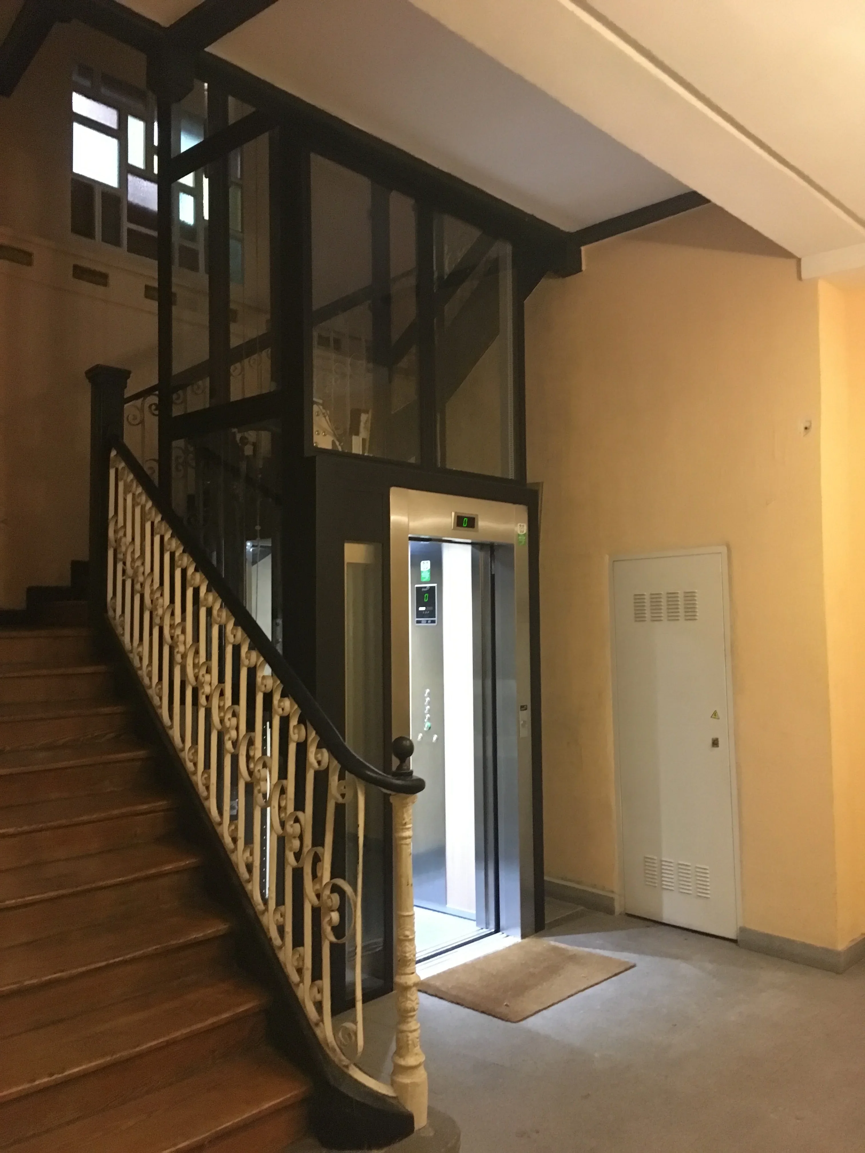 Elevator hall blending modern amenities with historic architecture